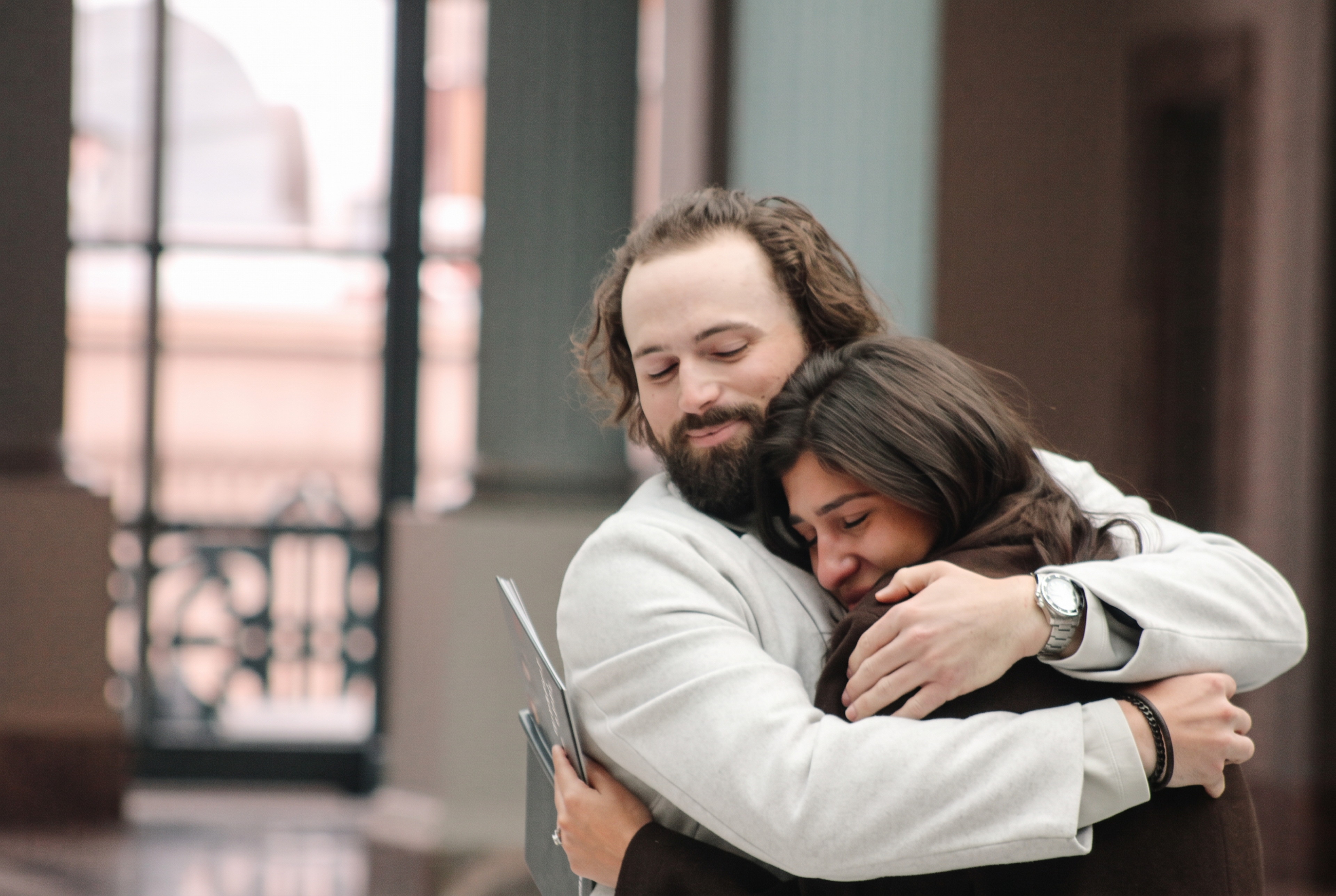 Nick and Mariella embracing